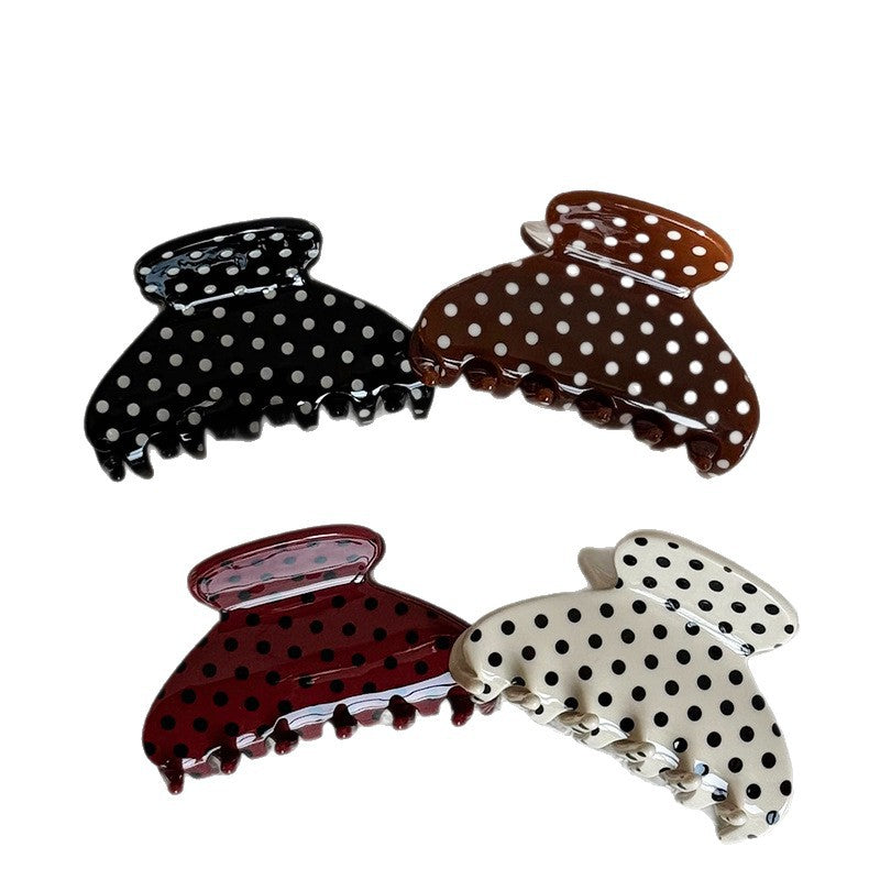 Polka dot acetate claw clips in black, brown, red, and cream