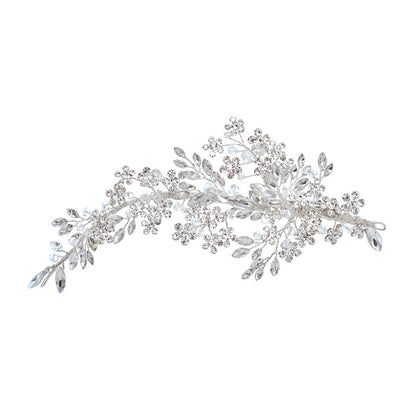 Long silver rhinestone hair accessory with branching floral and leaf design
