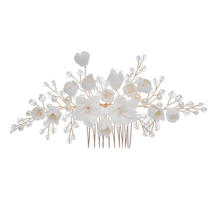 White floral bridal hair comb with pearl and crystal branch embellishments