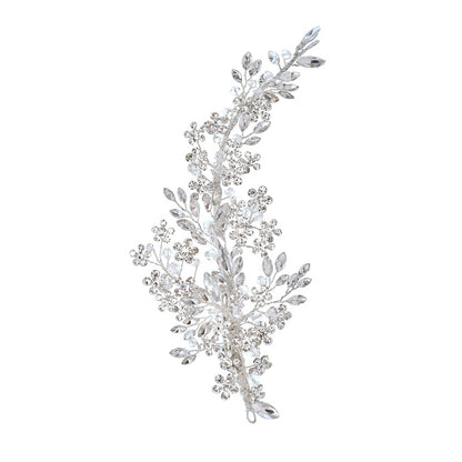 Silver rhinestone bridal hair vine with leaf and floral details, left-side view