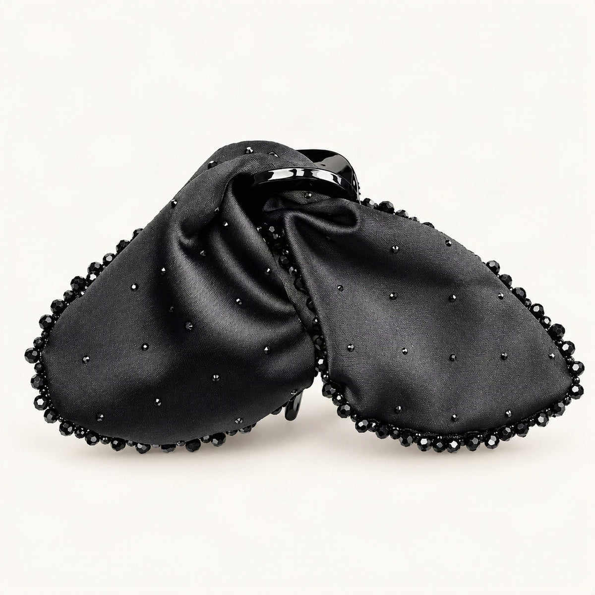 Close-up of black satin bow claw clip with dark rhinestone trim [FITINY Hair]