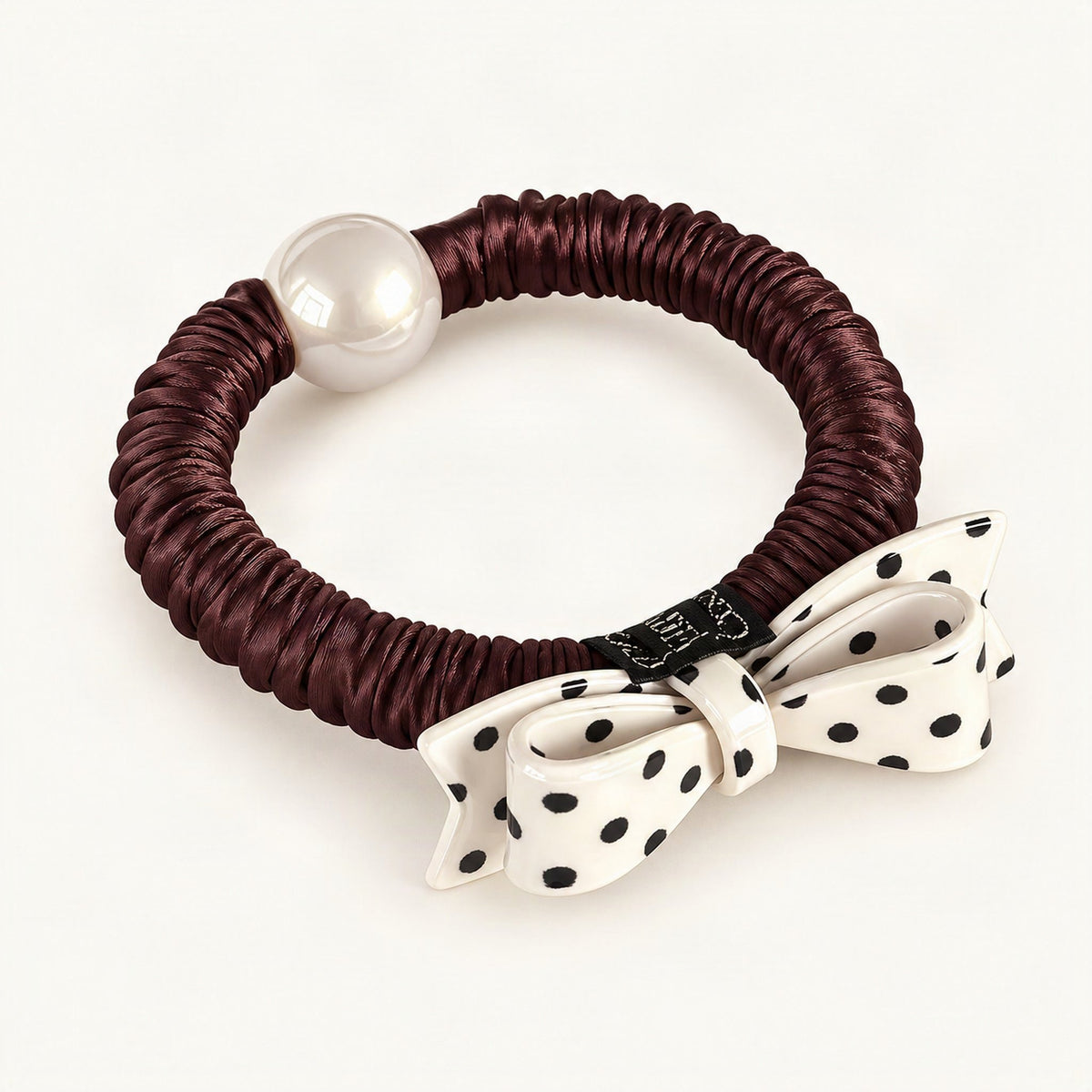 Burgundy polka dot bow hair tie shown as a hair accessory [FITINY Hair]