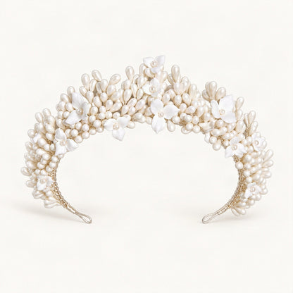 Floral bridal crown with faux pearl details arranged in a curved headpiece [FITINY Hair]