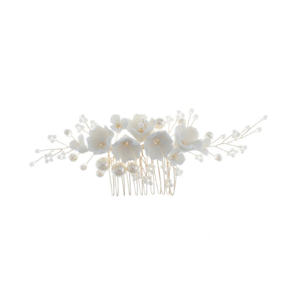 Full view of the floral hair comb with branching pearl details