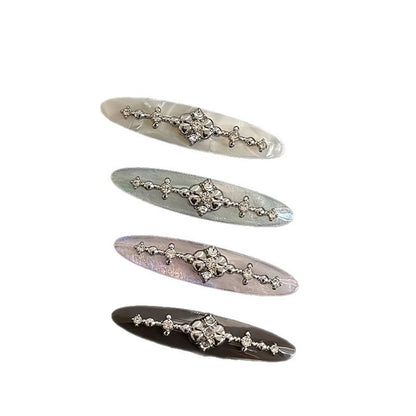 Acetate side hair clip with decorative metal detail in assorted colors