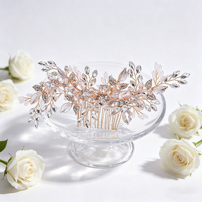 Floral crystal hair comb shown on a glass stand