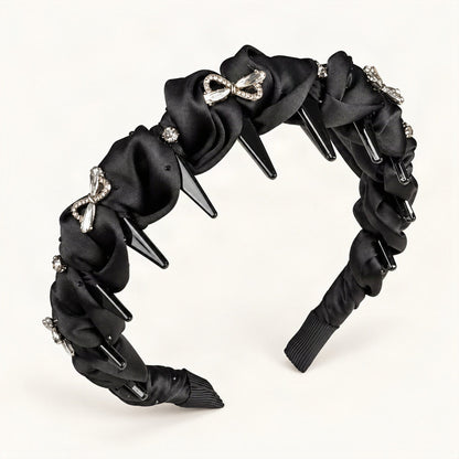 Padded satin headband with twisted pleats and rhinestone bow, front view [FITINY Hair]