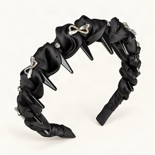 Padded satin headband with twisted pleats and rhinestone bow, front view [FITINY Hair]