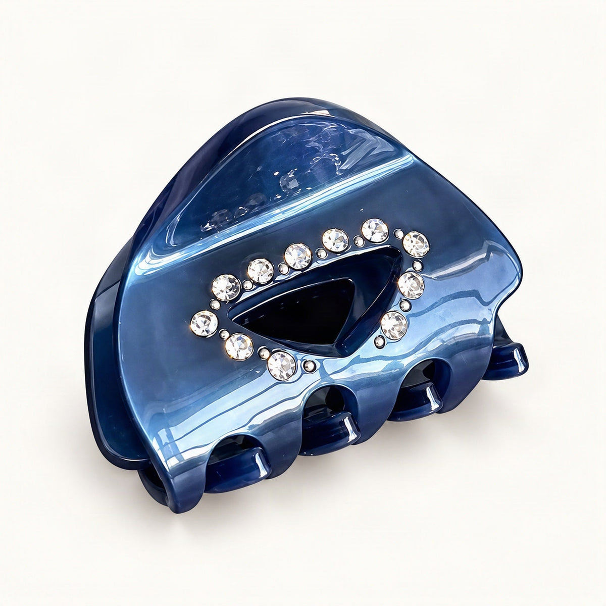 Compact blue cellulose acetate claw clip shown in a decorative hair accessory view [FITINY Hair]