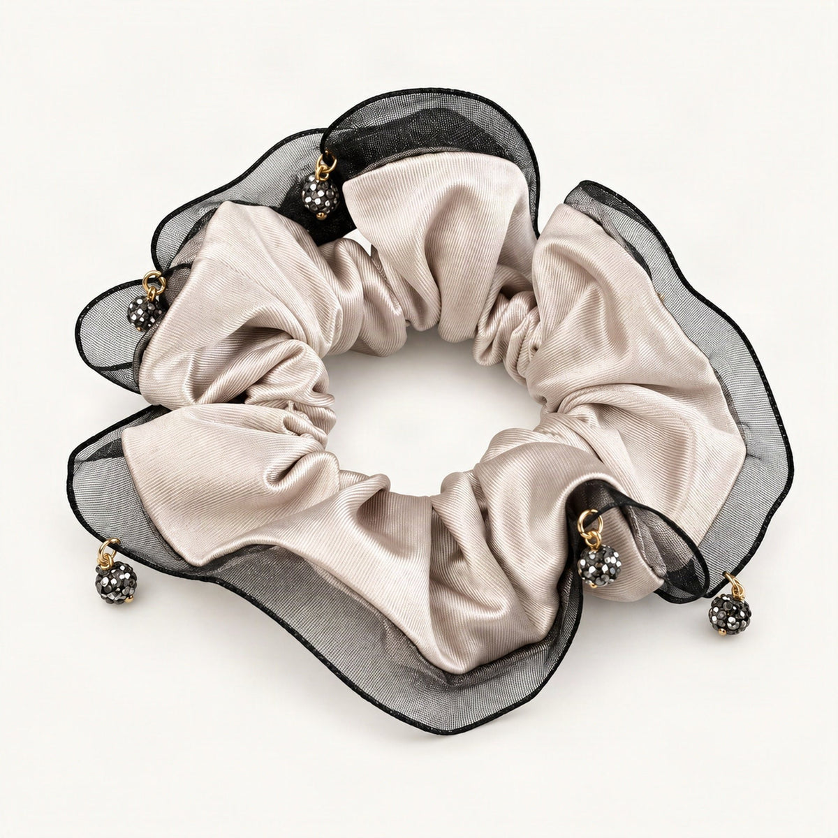 Light satin scrunchie showing its layered sheer trim and gathered fabric [FITINY Hair]