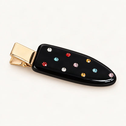 Black acetate hair clip shown as a compact side styling accessory [FITINY Hair]