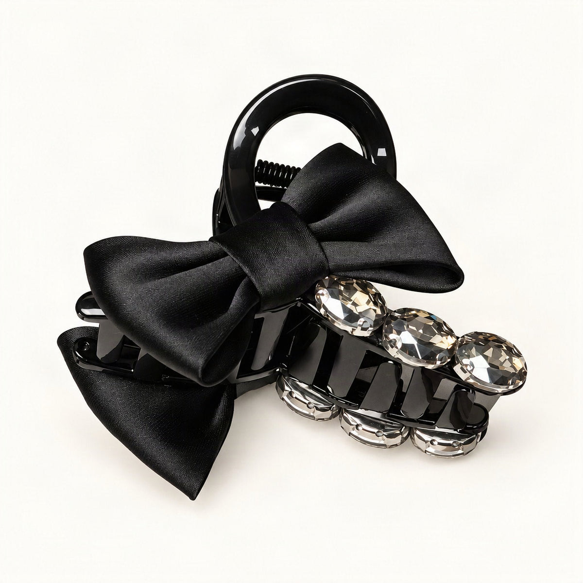 Black claw clip showing bow and rhinestone embellishments from another angle [FITINY Hair]