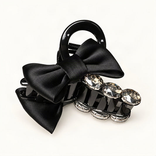 Black claw clip showing bow and rhinestone embellishments from another angle [FITINY Hair]