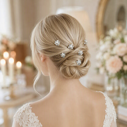 Floral pearl hair pins styled in a low wedding bun