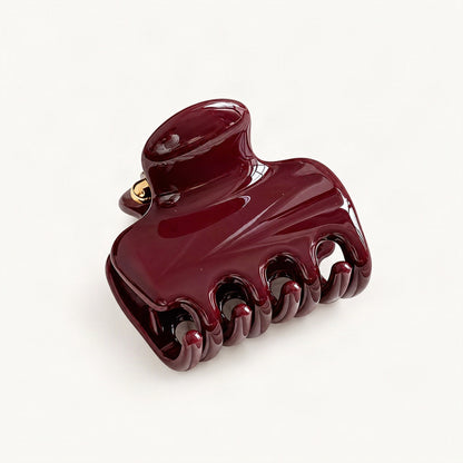 Red resin claw hair clip shown from the front [FITINY Hair]