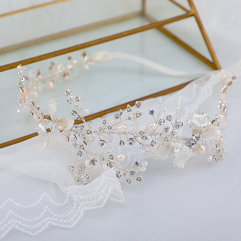 Silver floral bridal hair vine with pearl and rhinestone details