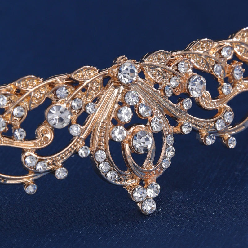 Vintage rhinestone tiara photographed at an angled side view