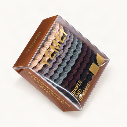 Cream, grey, and chocolate hair ties displayed together [FITINY Hair]