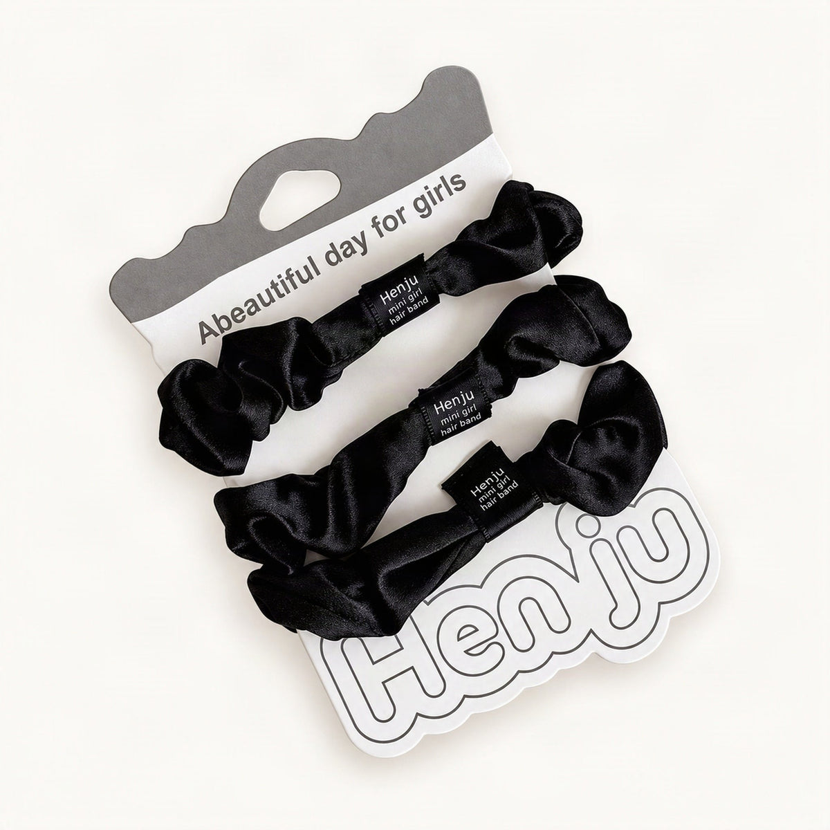 Three black satin scrunchies arranged as a color assortment [FITINY Hair]