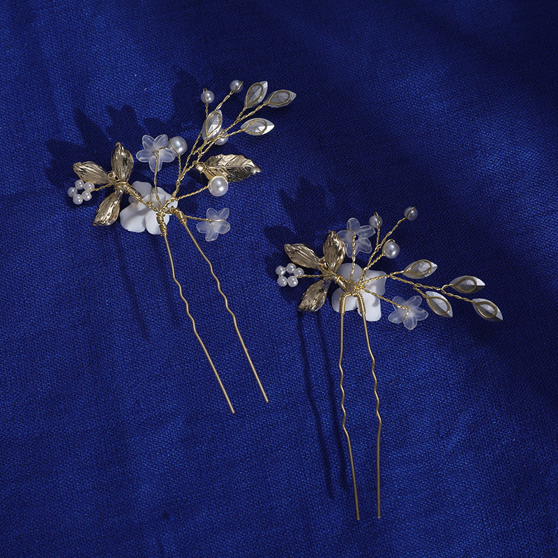 Back view of matching decorative hair pins