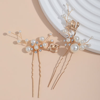 Hair comb and two coordinated pins displayed together