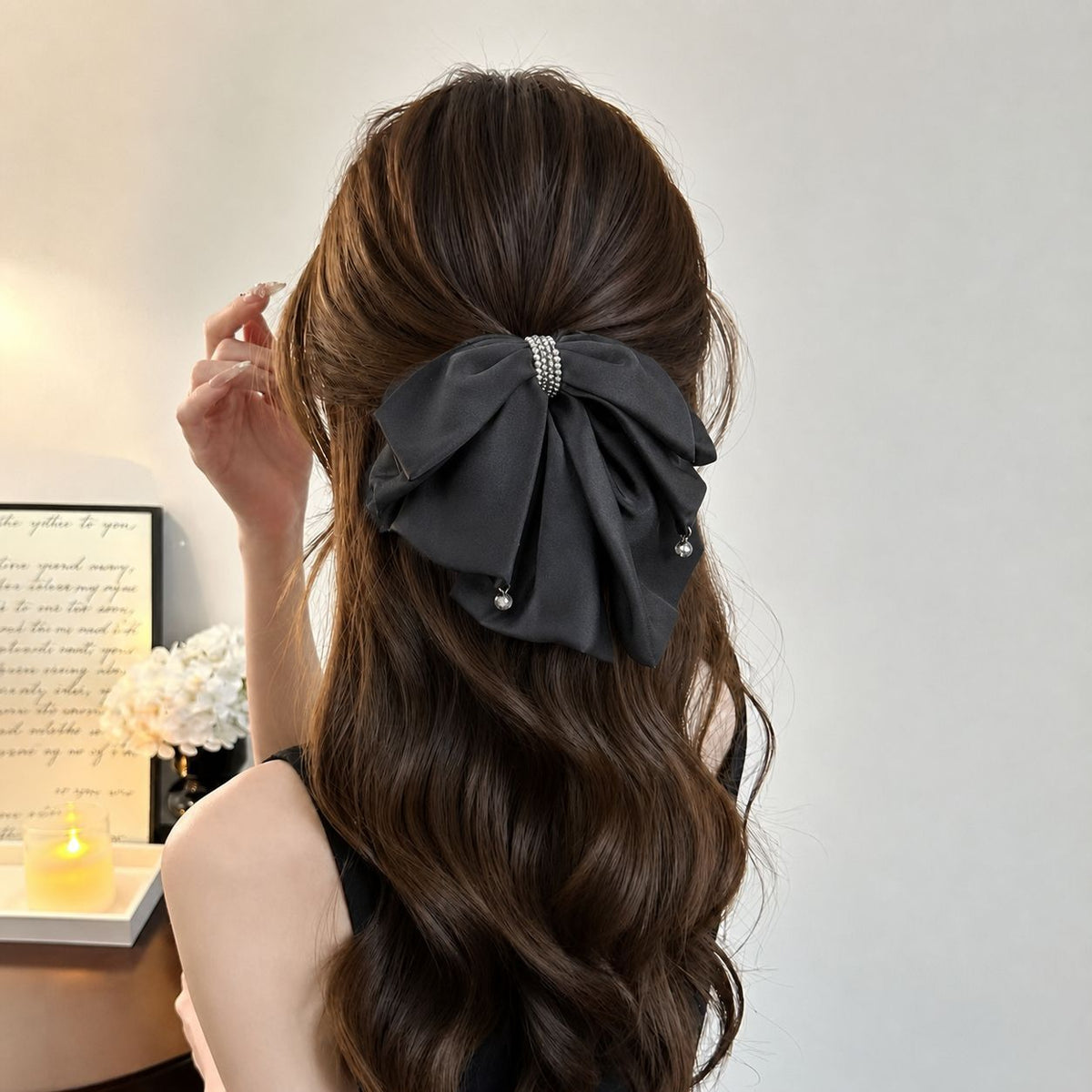 Bow hair clip styled in long hair