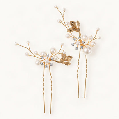 Two matching gold-tone hair pins decorated with faux pearls and leaf details [FITINY Hair]