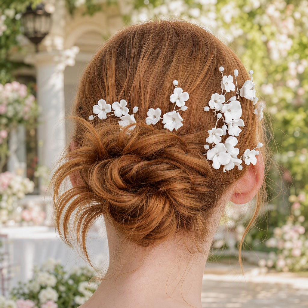 White ceramic flower U pins styled in a bridal updo