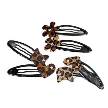 Acrylic flower hair clip with leopard print and rhinestone accent