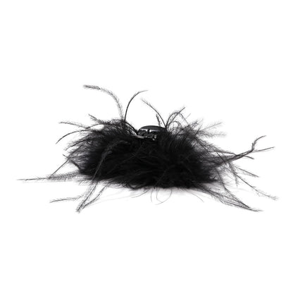 Black feather claw clip arranged on a white background