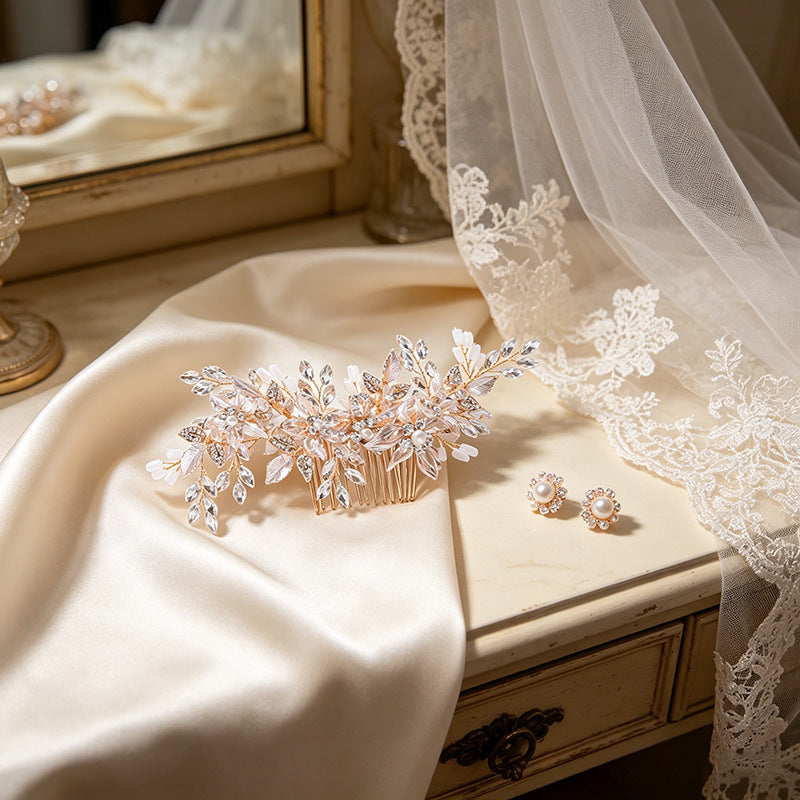 Bridal hair comb displayed beside wedding accessories