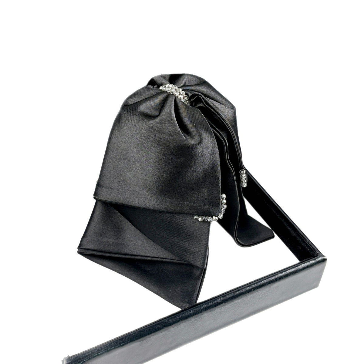 Satin bow claw clip shown against a light background