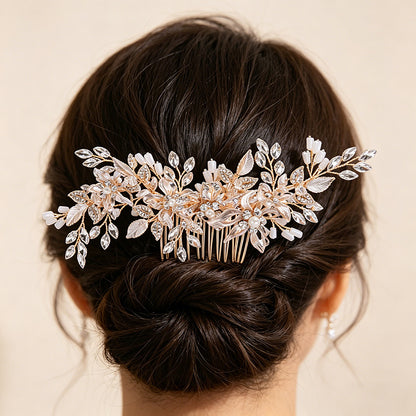 Floral bridal hair comb worn in a dark updo