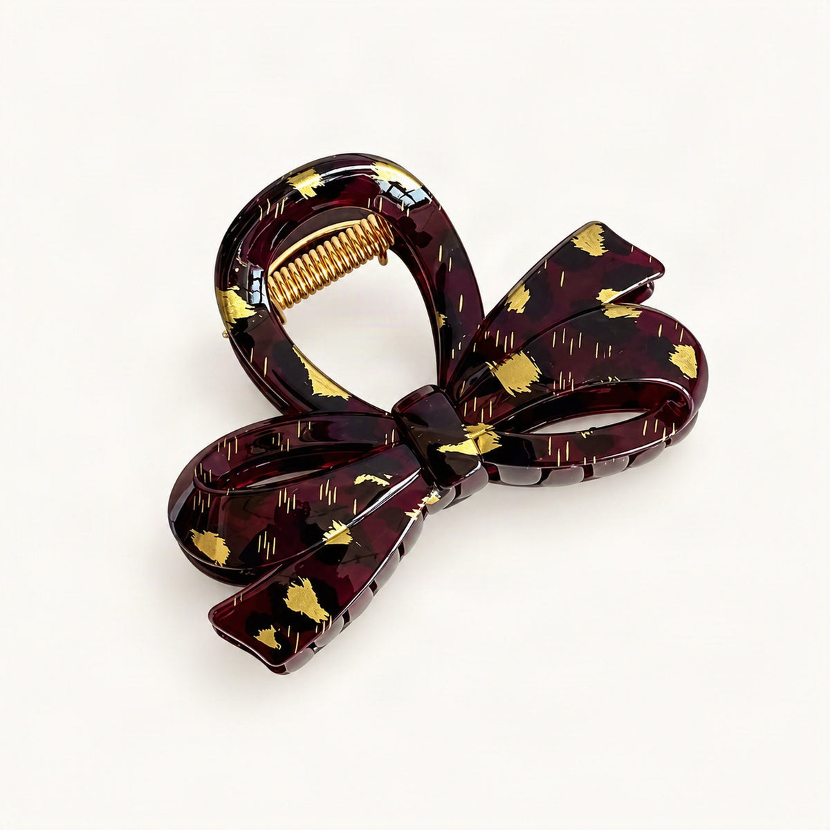French-inspired resin claw clip showing its geometric openwork shape [FITINY Hair]