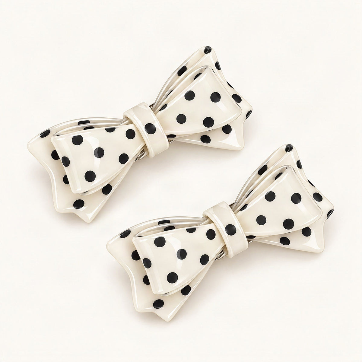 Pair of polka dot bow side clips displayed together [FITINY Hair]