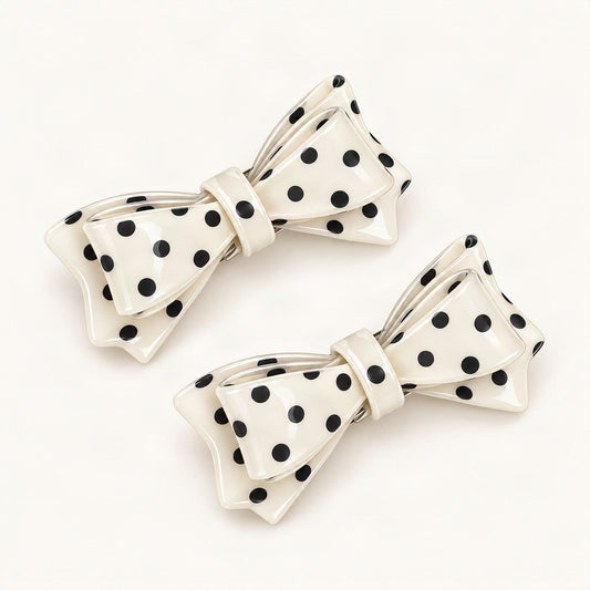 Pair of polka dot bow side clips displayed together [FITINY Hair]