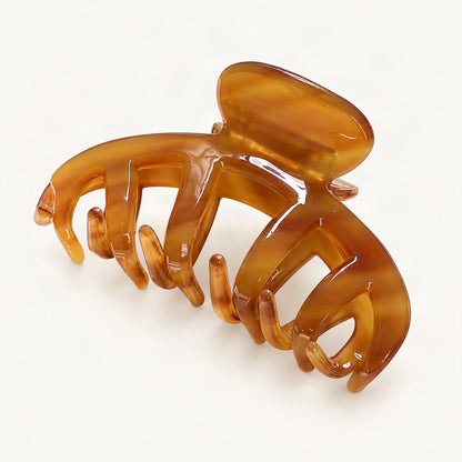 Amber stripe claw clip showing its patterned acetate finish [FITINY Hair]