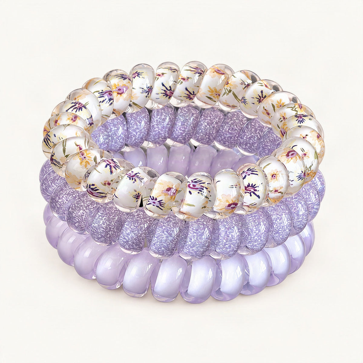 Three purple elastic hair ties shown as a set [FITINY Hair]