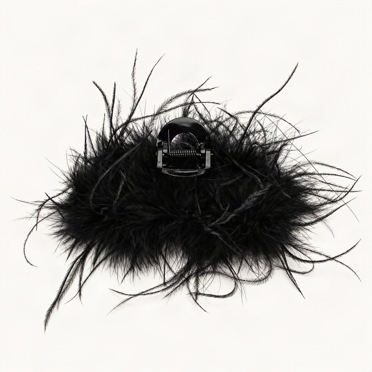 Black feather claw clip viewed from the back showing acrylic clip base [FITINY Hair]