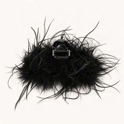 Black feather claw clip viewed from the back showing acrylic clip base [FITINY Hair]