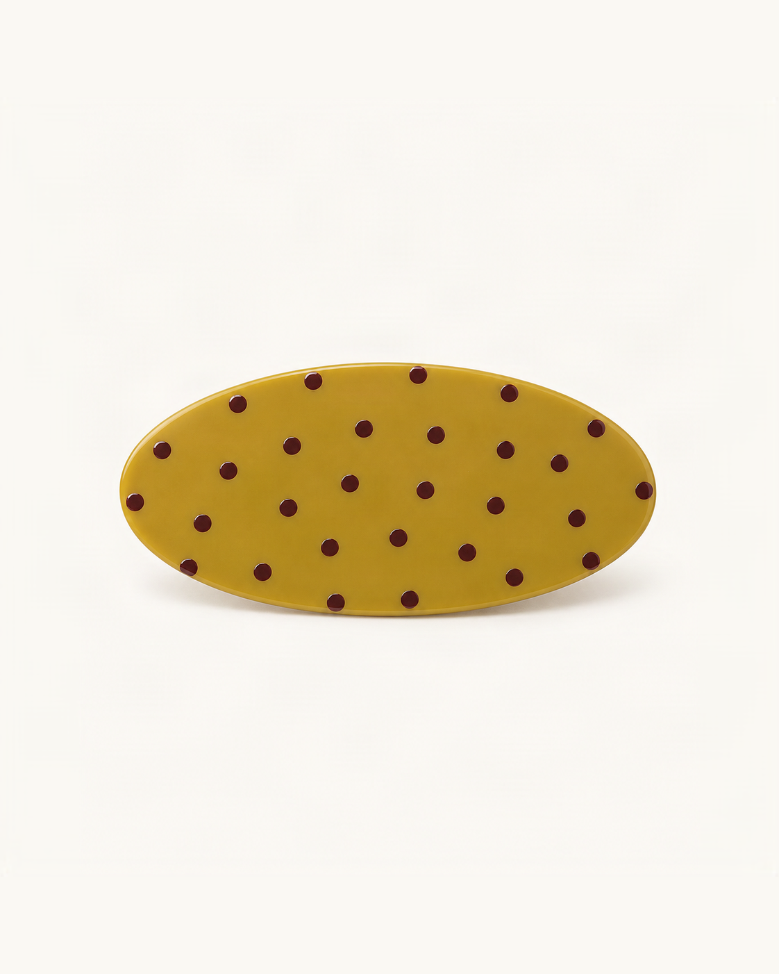 Oval Polka Dot Acetate Barrette — single accessory on warm ivory background [FITINY Hair]