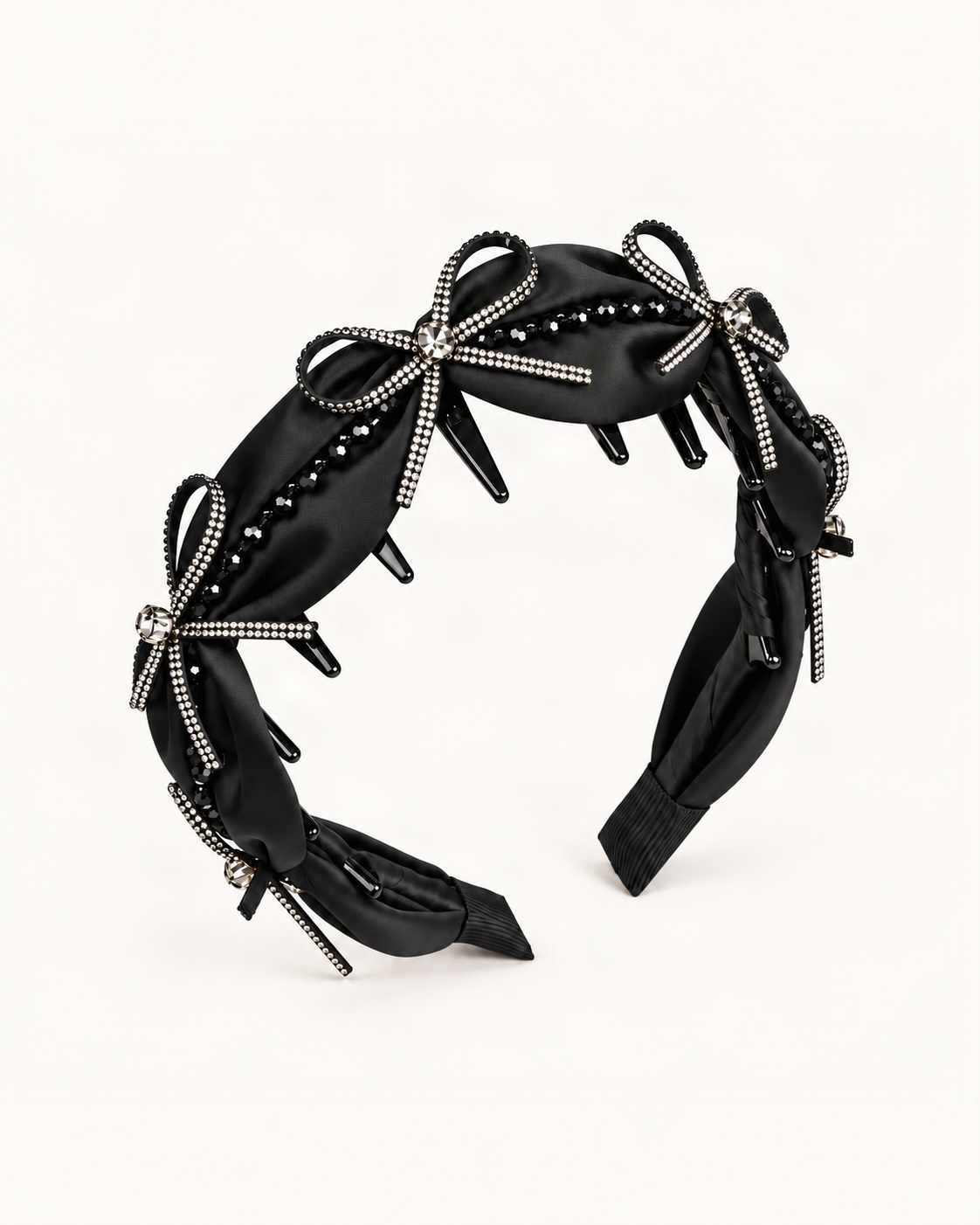 Satin Rhinestone Bow High Crown Toothed Headband — Black / Beaded variant on a warm ivory background [FITINY Hair variant 48004038754475]