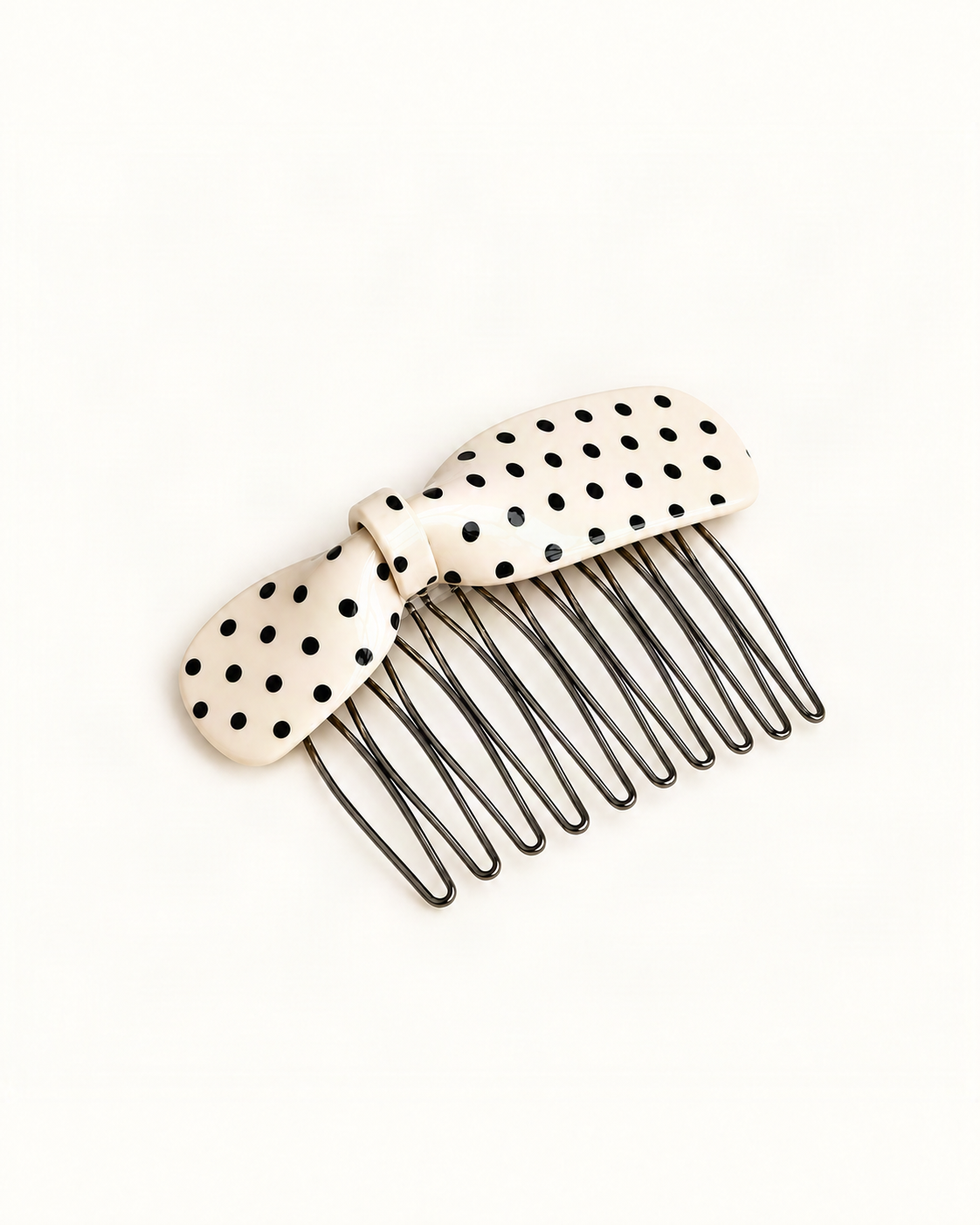 Cellulose Acetate Polka Dot Bow Side Comb — single accessory on warm ivory background [FITINY Hair]