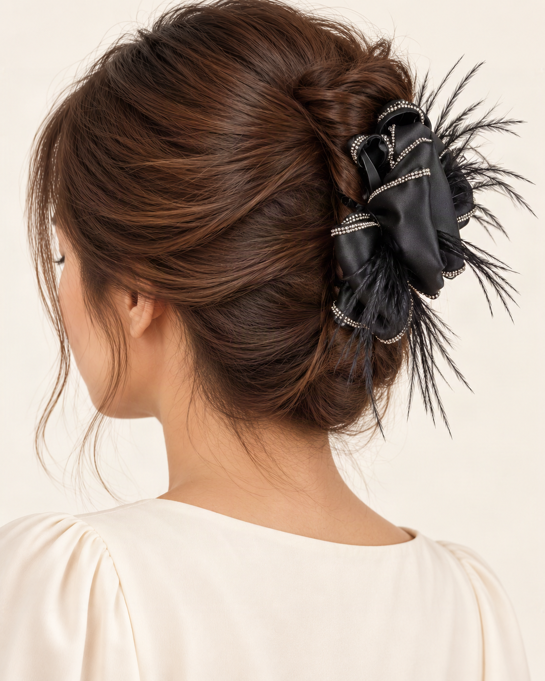 Satin Bow Feather Claw Clip with Rhinestone Trim — shown worn in natural hair to show placement and scale [FITINY Hair model]