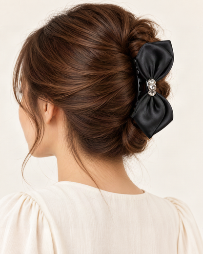 Large Satin Bow Claw Clip with Rhinestone Center — shown worn in natural hair to show placement and scale [FITINY Hair model]