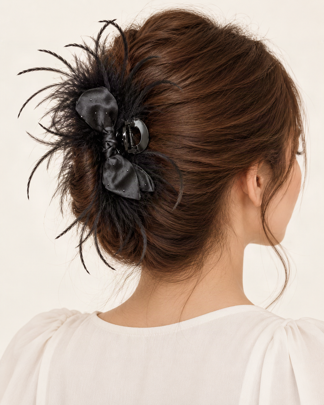 Ostrich Feather Rhinestone Satin Bow Hair Claw Clip — shown worn in natural hair to show placement and scale [FITINY Hair model]