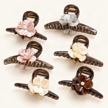 Six floral acrylic claw clips with pearl centers on warm ivory [FITINY Hair]