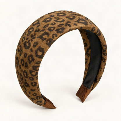 Wide Padded Fabric Headband with Textured Finish — leopard print front three-quarter view on warm ivory [FITINY Hair]
