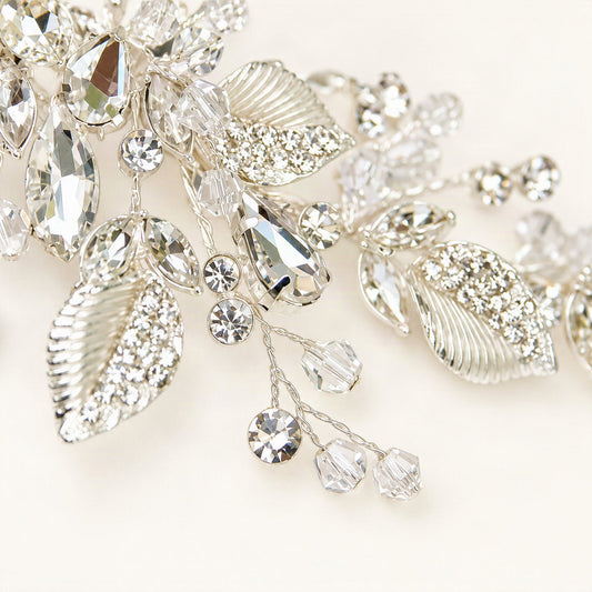 Macro detail of ribbed silver leaves, rhinestones and crystal wire branches [FITINY Hair]