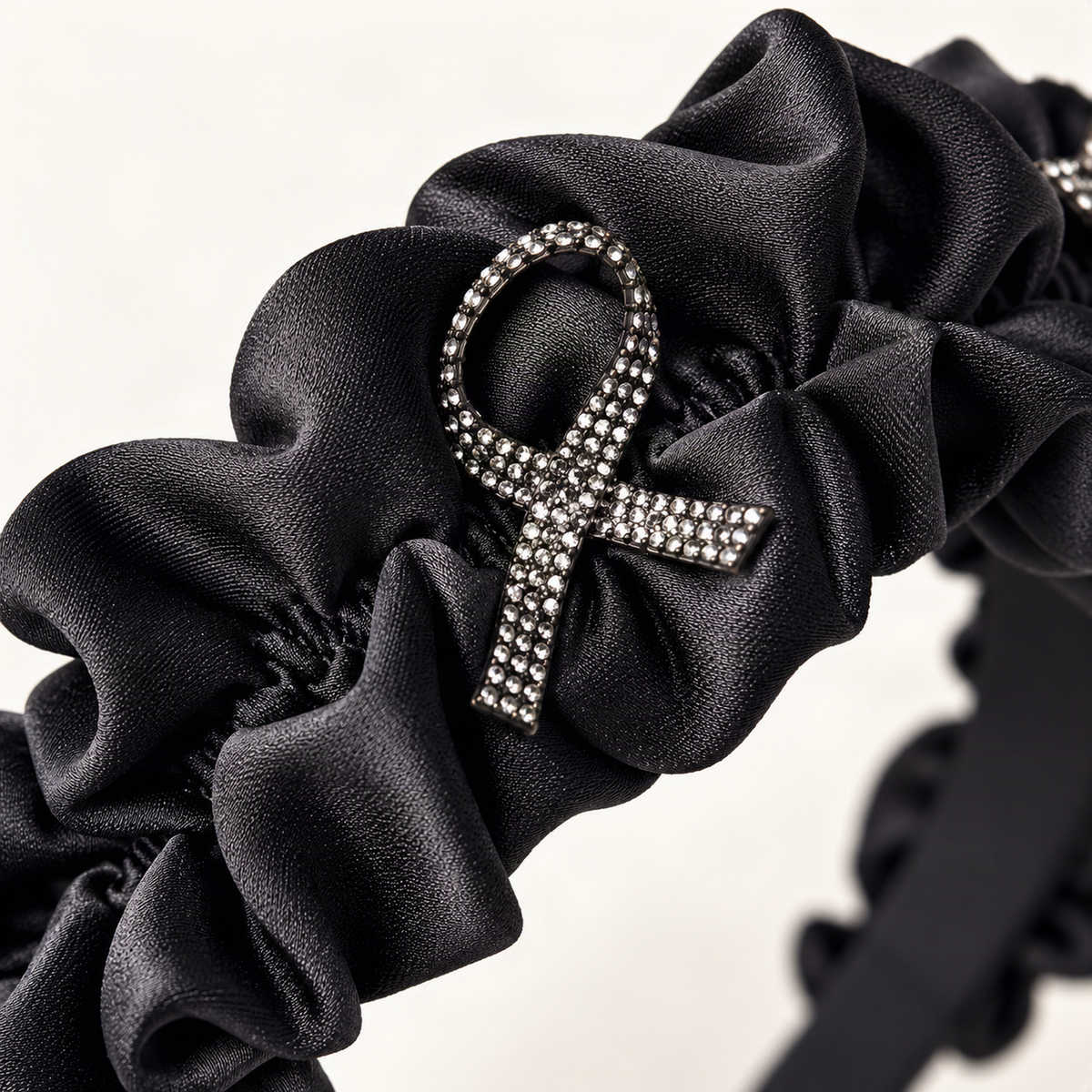 Rhinestone Bow Satin Padded Headband with Ruffled Trim — close-up of rhinestone bow and satin trim [FITINY Hair]